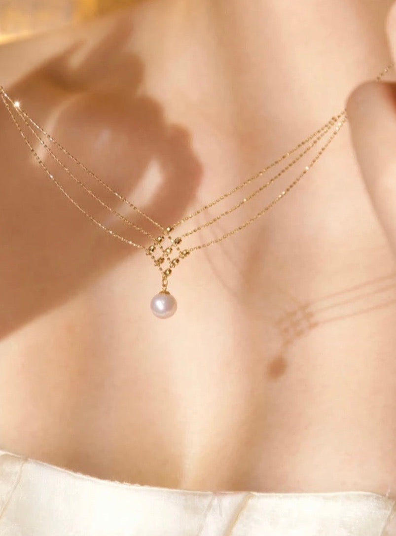 Collar de perlas de agua dulce con baño de oro 24k