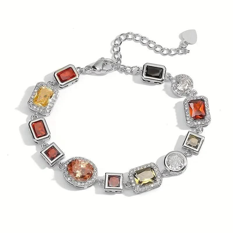Conjunto de joyas moderno con diseño geométrico de circonitas