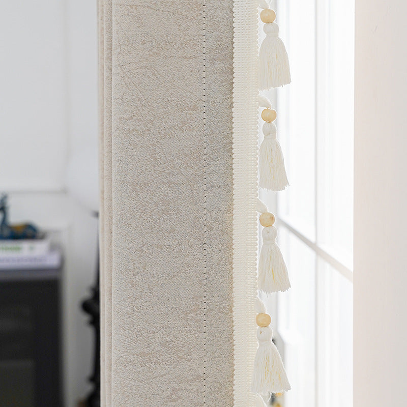 Cortina decorativa con flecos