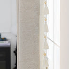 Cortina decorativa con flecos