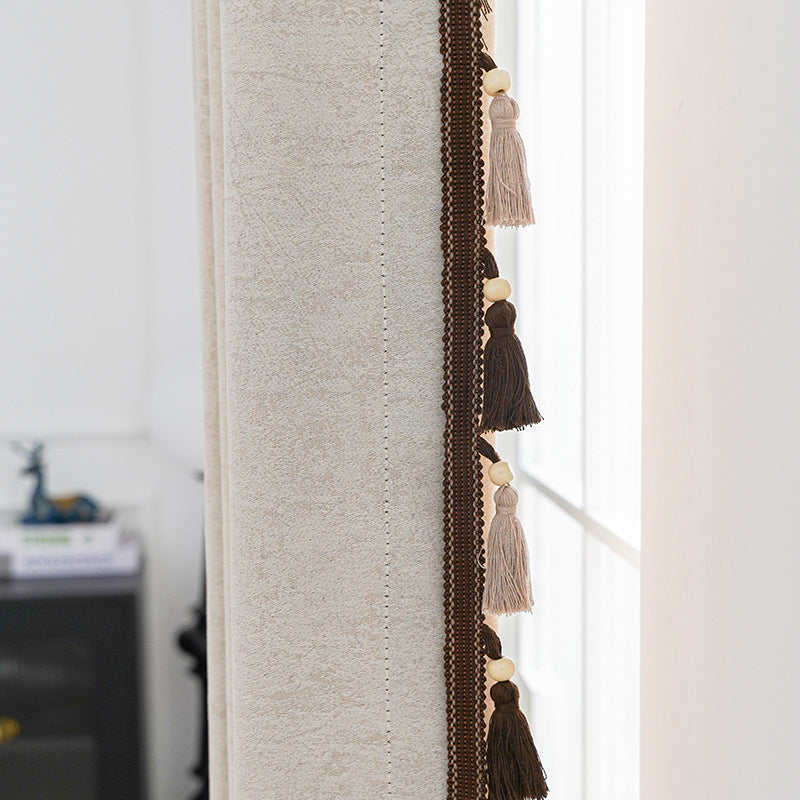 Cortina decorativa con flecos