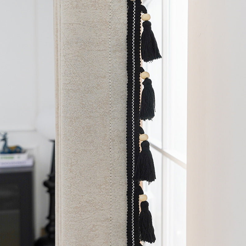 Cortina decorativa con flecos