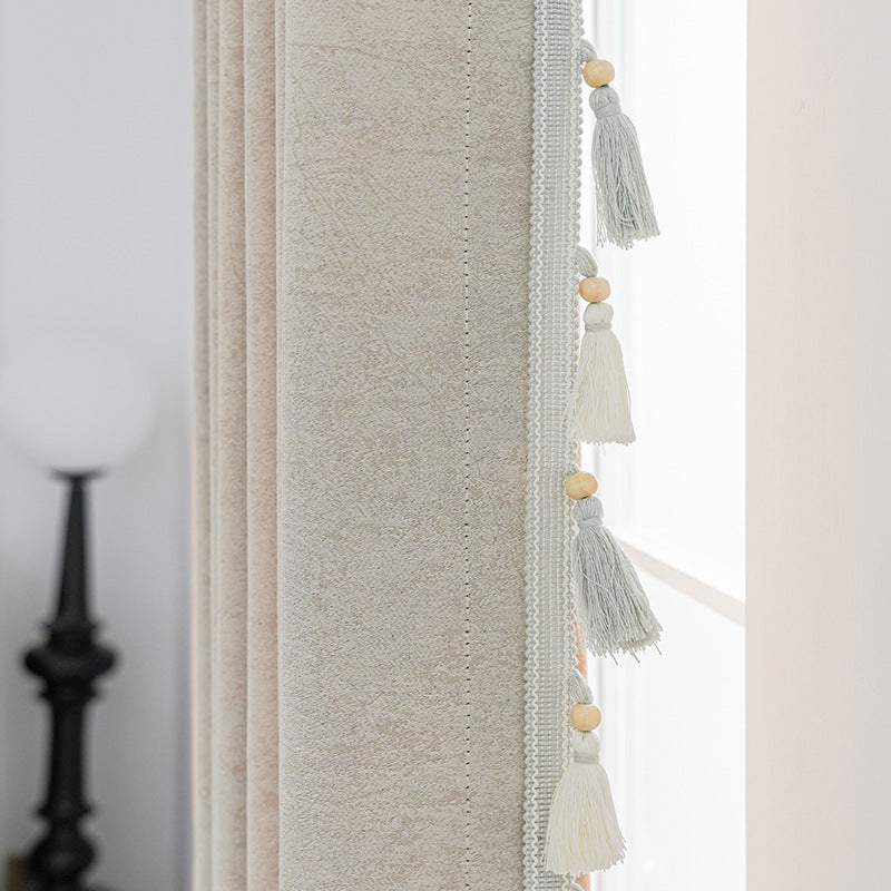 Cortina decorativa con flecos