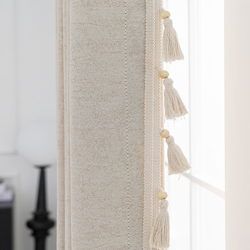 Cortina decorativa con flecos