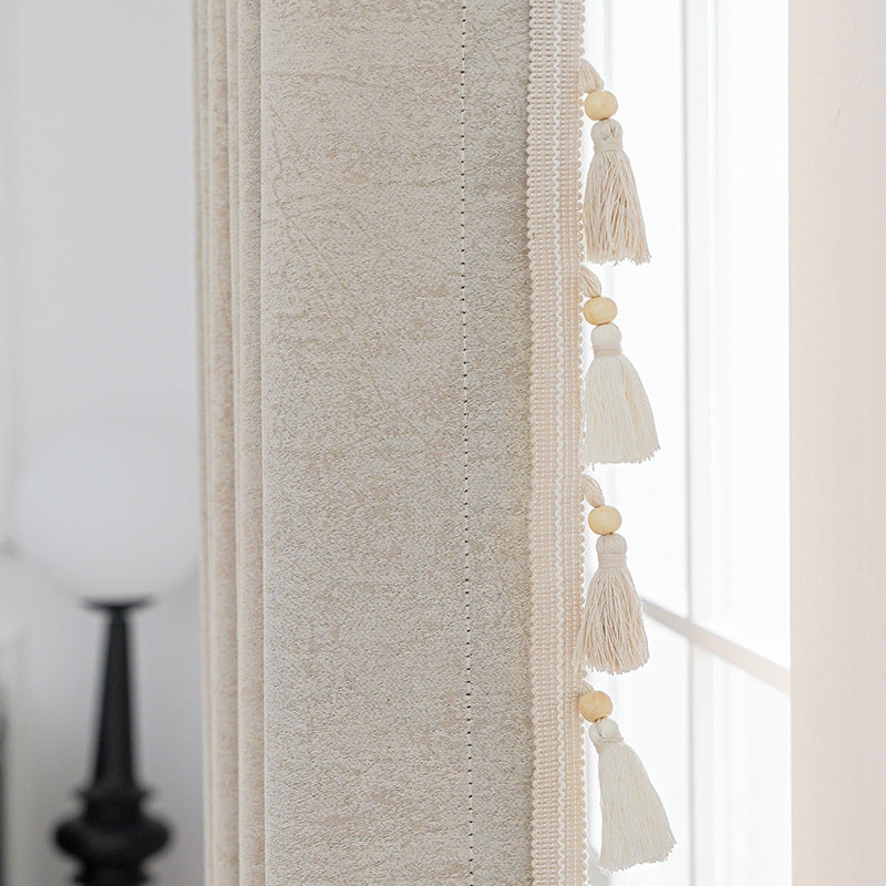 Cortina decorativa con flecos