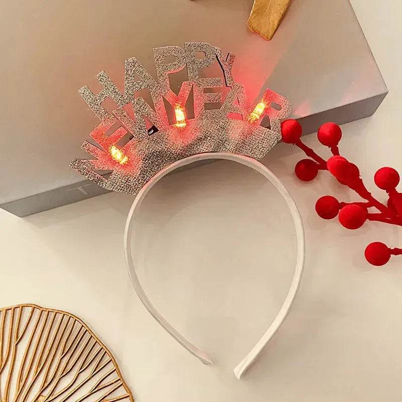 Diadema navideña luminosa con copo de nieve para mujer