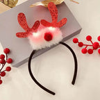 Diadema navideña luminosa con copo de nieve para mujer