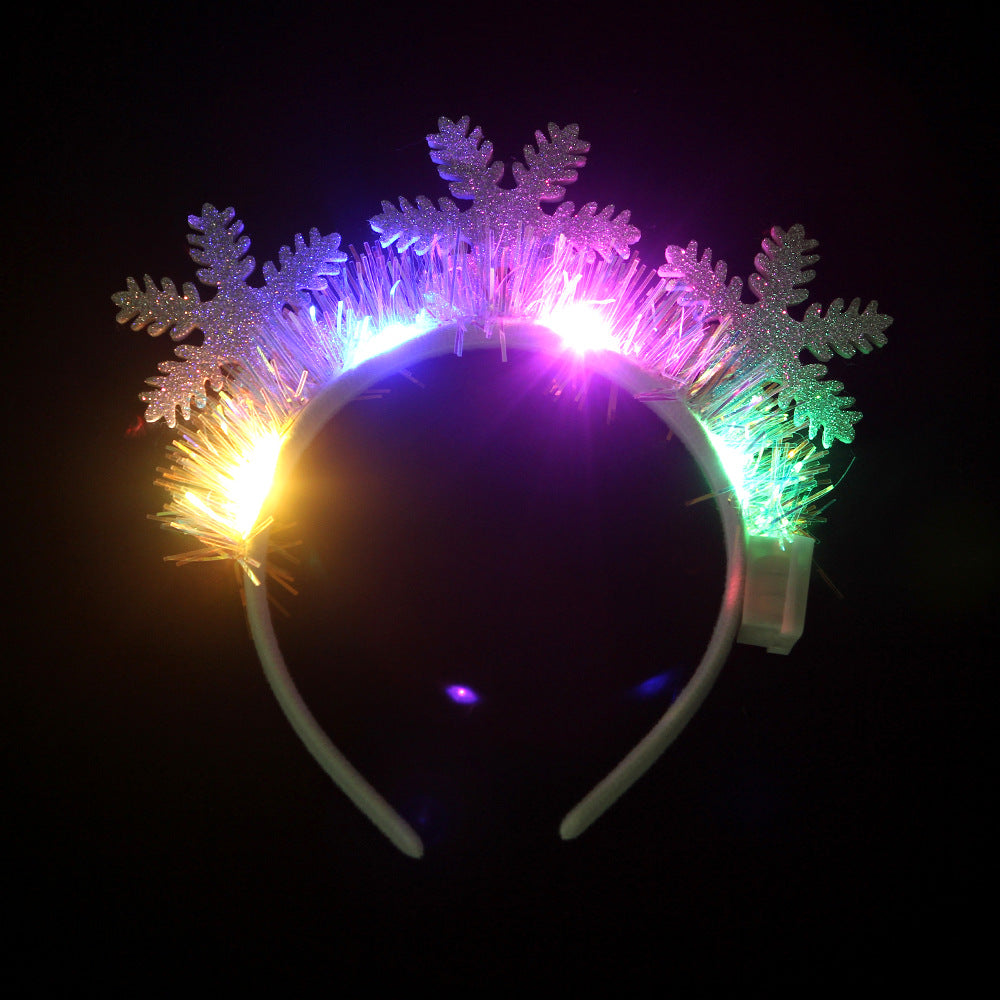 Diadema navideña luminosa con diseños festivos
