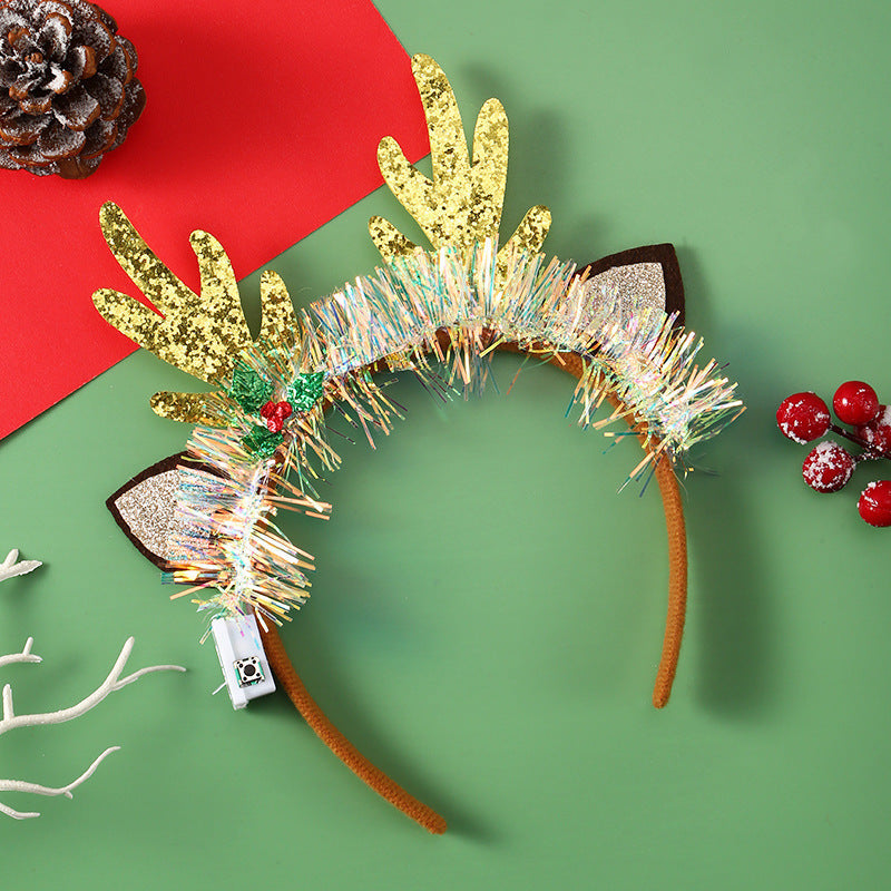 Diadema navideña luminosa con diseños festivos