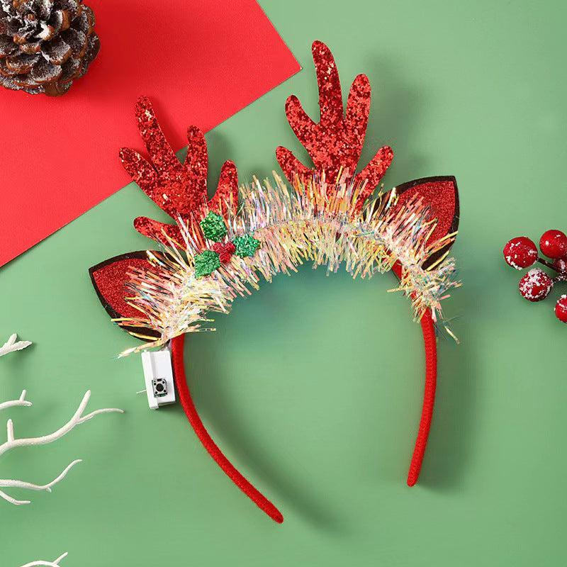 Diadema navideña luminosa con diseños festivos