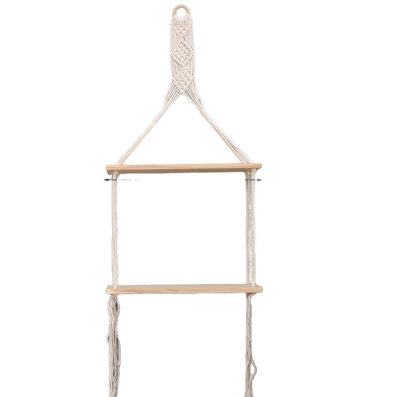 Estantería de pared de macramé con baldas de madera