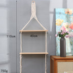 Estantería de pared de macramé con baldas de madera
