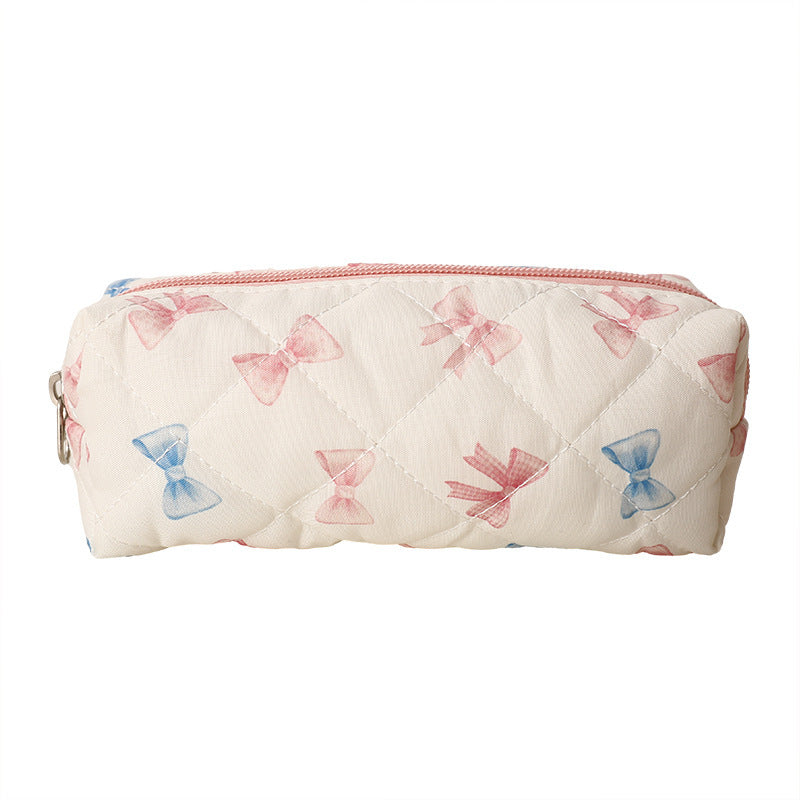 Estuche acolchado con estampado de lazos