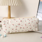 Estuche acolchado con estampado de lazos
