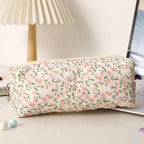 Estuche acolchado con estampado de lazos