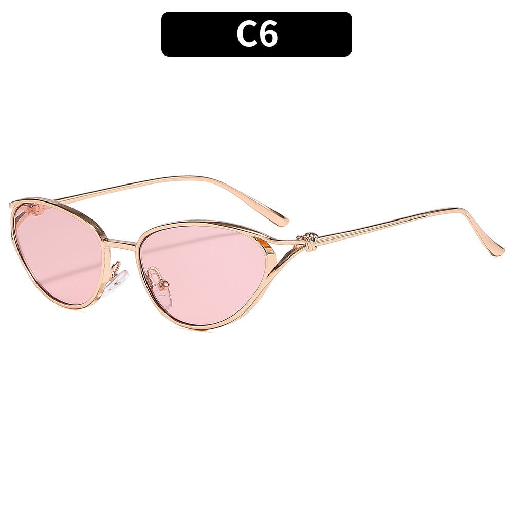 Gafas de sol cat-eye elegantes con detalles metálicos premium