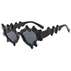 Gafas de sol de mujer con diseño de onda extravagante