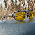 Gafas de sol deportivas fotocromáticas polarizadas con lentes de visión nocturna mejorada y montura envolvente táctica