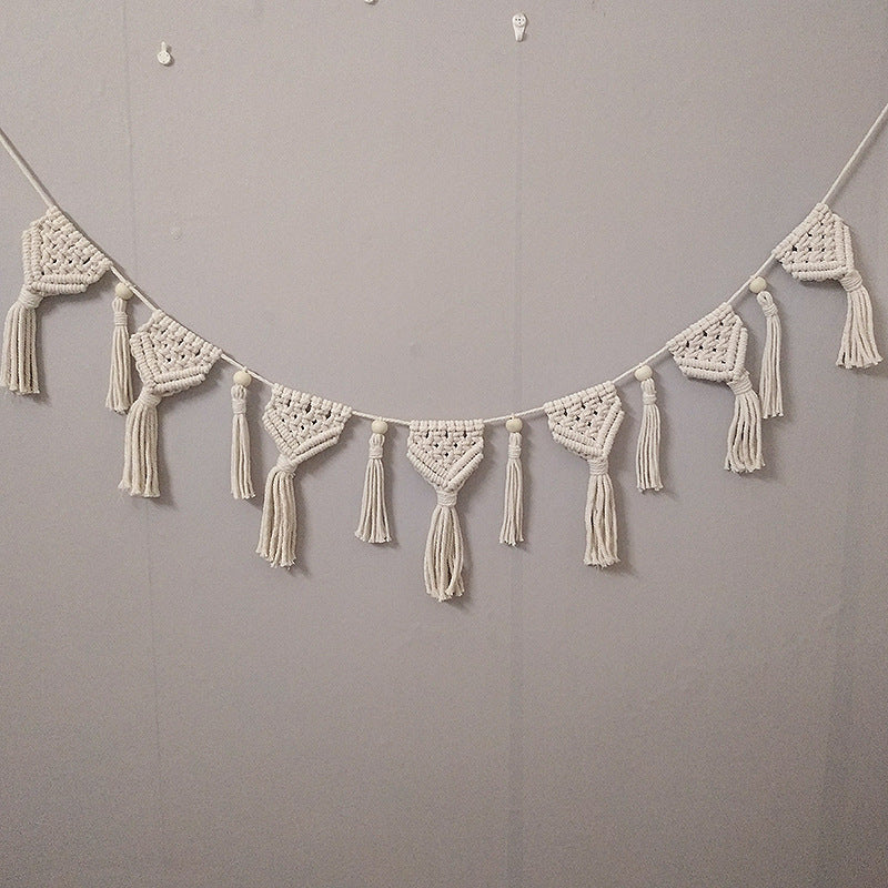 Guirnalda decorativa de macramé para pared