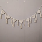 Guirnalda decorativa de macramé para pared