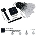 Guirnalda LED solar decorativa con formas variadas para exterior