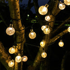 Guirnalda LED solar decorativa con formas variadas para exterior