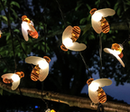 Guirnalda LED solar decorativa con formas variadas para exterior