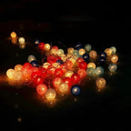Guirnalda de luces LED con bolas de algodón en tonos pastel