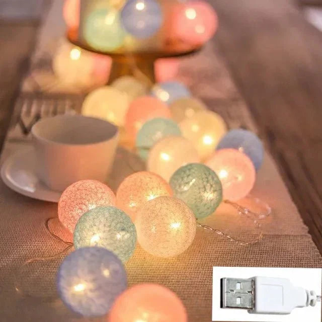 Guirnalda de luces LED con bolas de algodón en tonos pastel