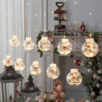 Guirnalda de luces LED con bolas decorativas de Navidad
