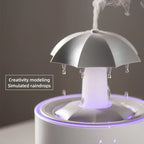 Humidificador de aire con forma de paraguas y gotas de agua