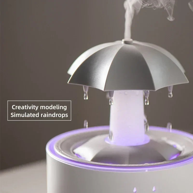 Humidificador de aire con forma de paraguas y gotas de agua