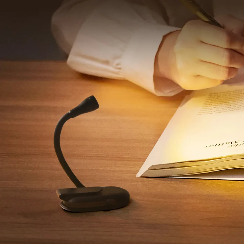 Luz de lectura con brazo flexible y pinza con muelle, recargable por USB