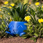 Maceta de cerámica con cara para plantas pequeñas