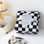 Manta de cuadros elegante y acogedora para tu hogar