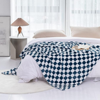 Manta de cuadros elegante y acogedora para tu hogar