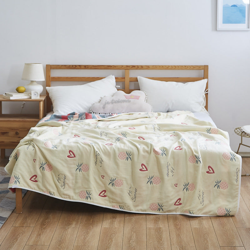 Manta elegante con sutil estampado de hojas