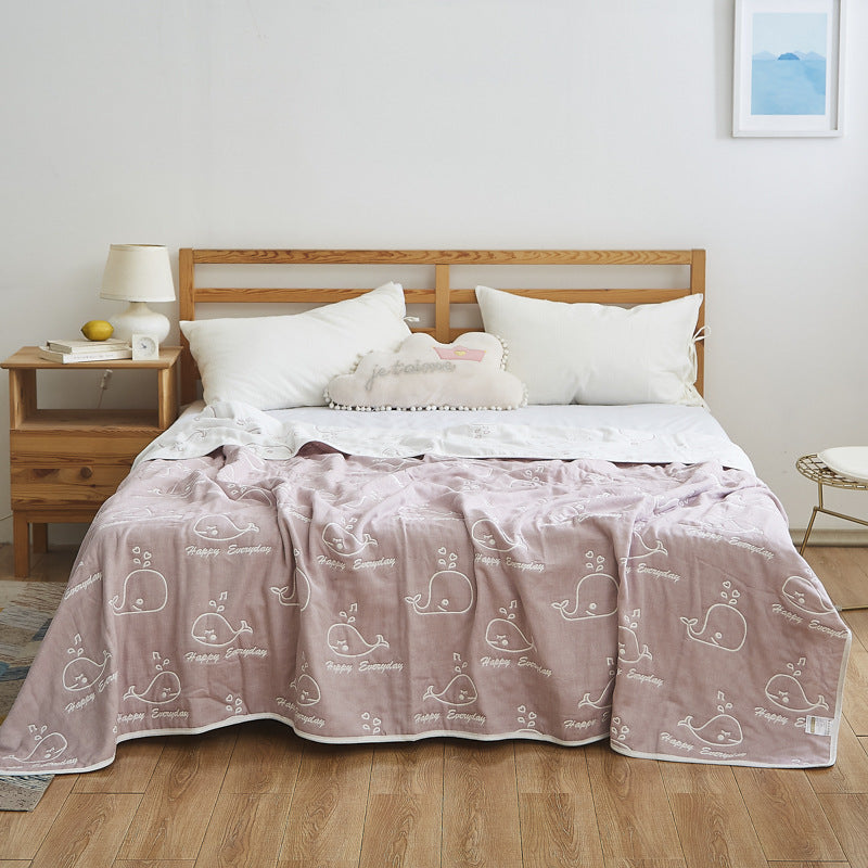 Manta elegante con sutil estampado de hojas
