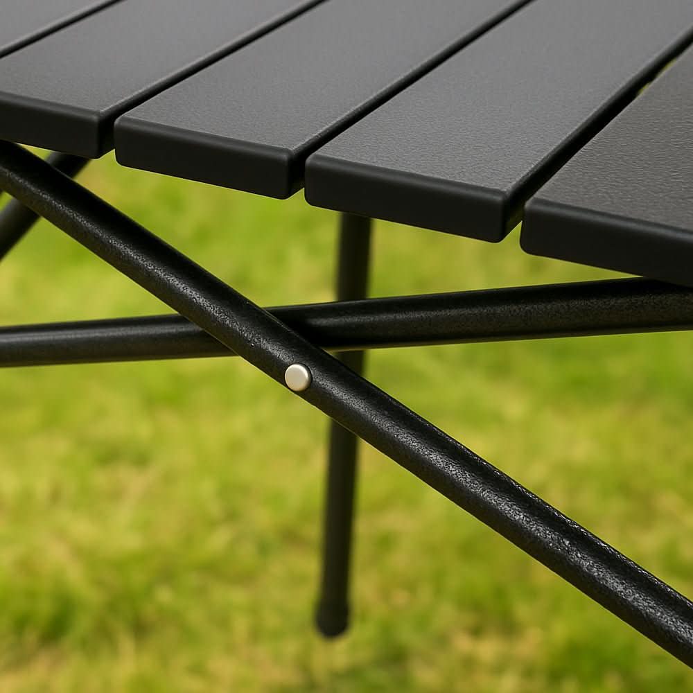 Mesa plegable de exterior con superficie resistente al calor y a los arañazos