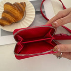 Mini bolso bandolera tipo clutch