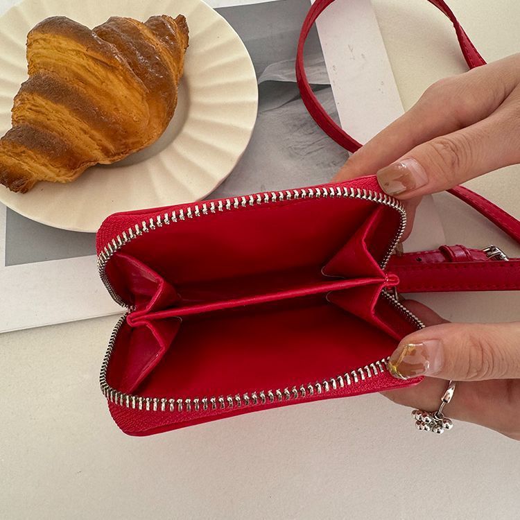 Mini bolso bandolera tipo clutch