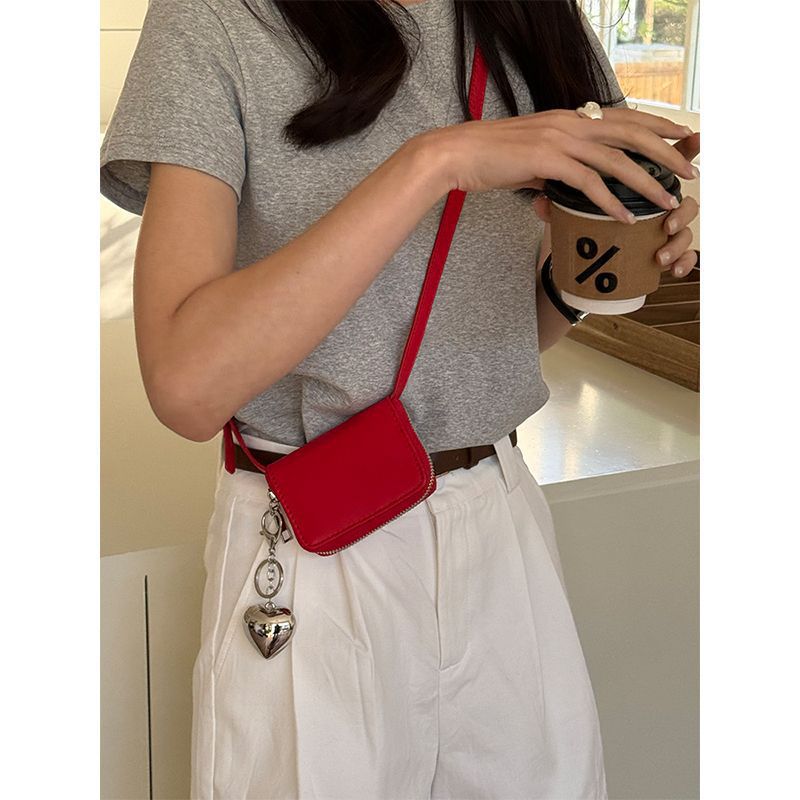 Mini bolso bandolera tipo clutch