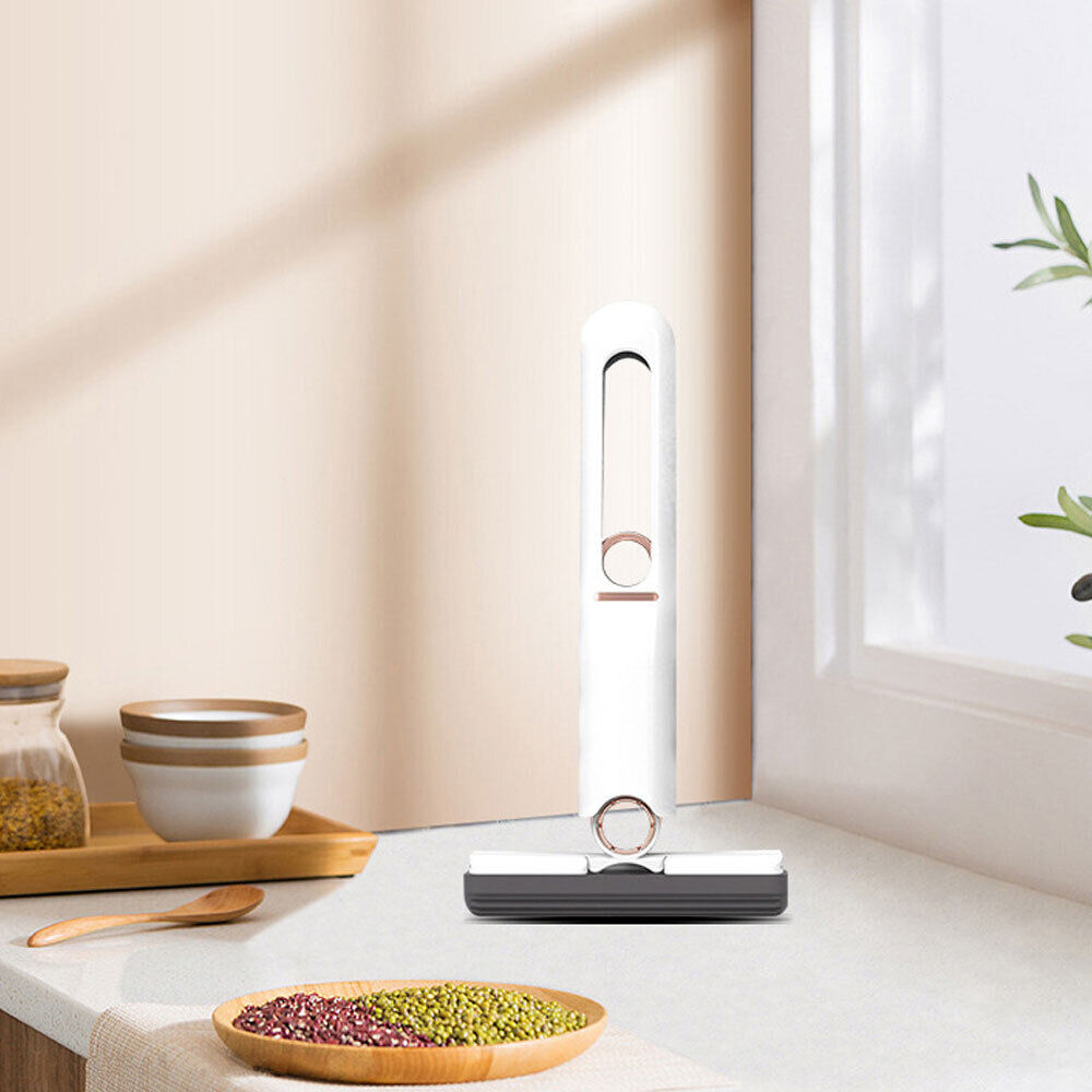 Mini fregona con escurridor automático para limpieza del hogar
