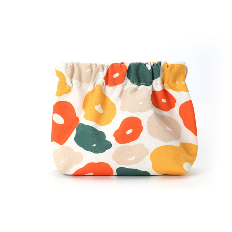 Mini monedero portátil con detalles de granate