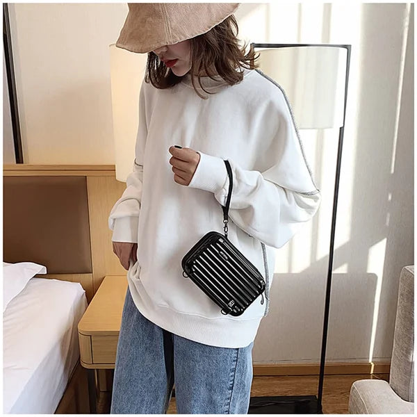 Minibolso tipo maleta elegante para uso diario