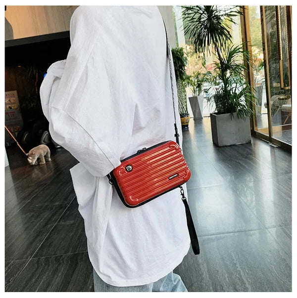 Minibolso tipo maleta elegante para uso diario