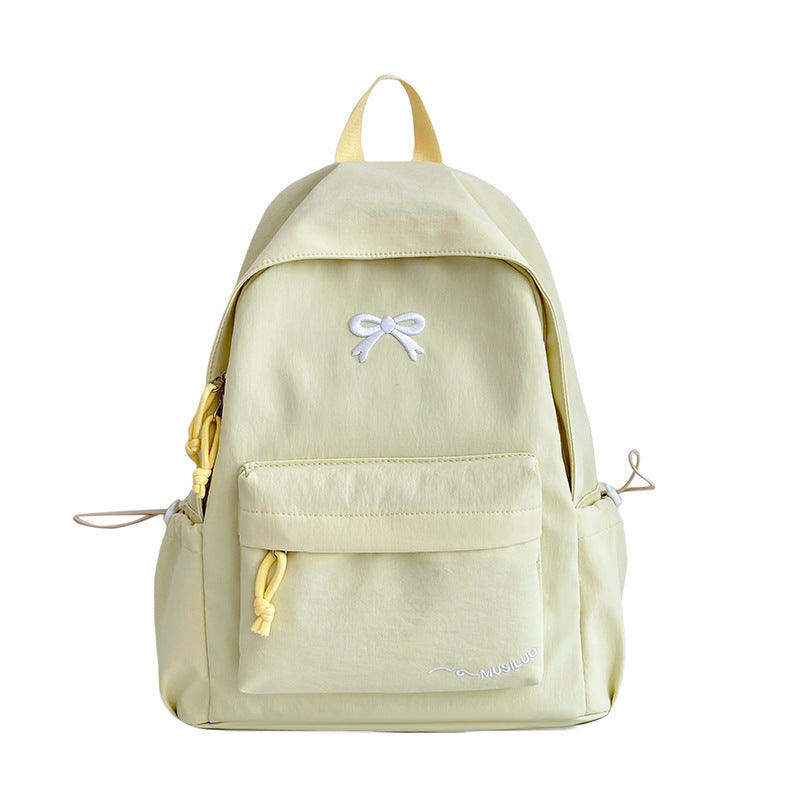 Mochila escolar casual con lazo en relieve, resistente al agua, tirantes acolchados