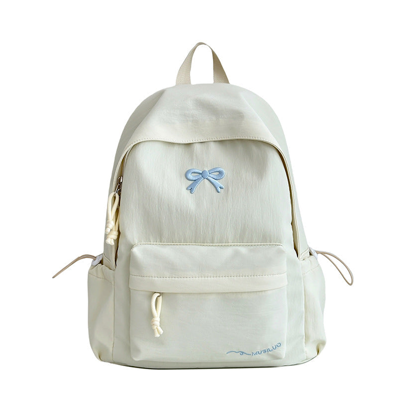 Mochila escolar casual con lazo en relieve, resistente al agua, tirantes acolchados