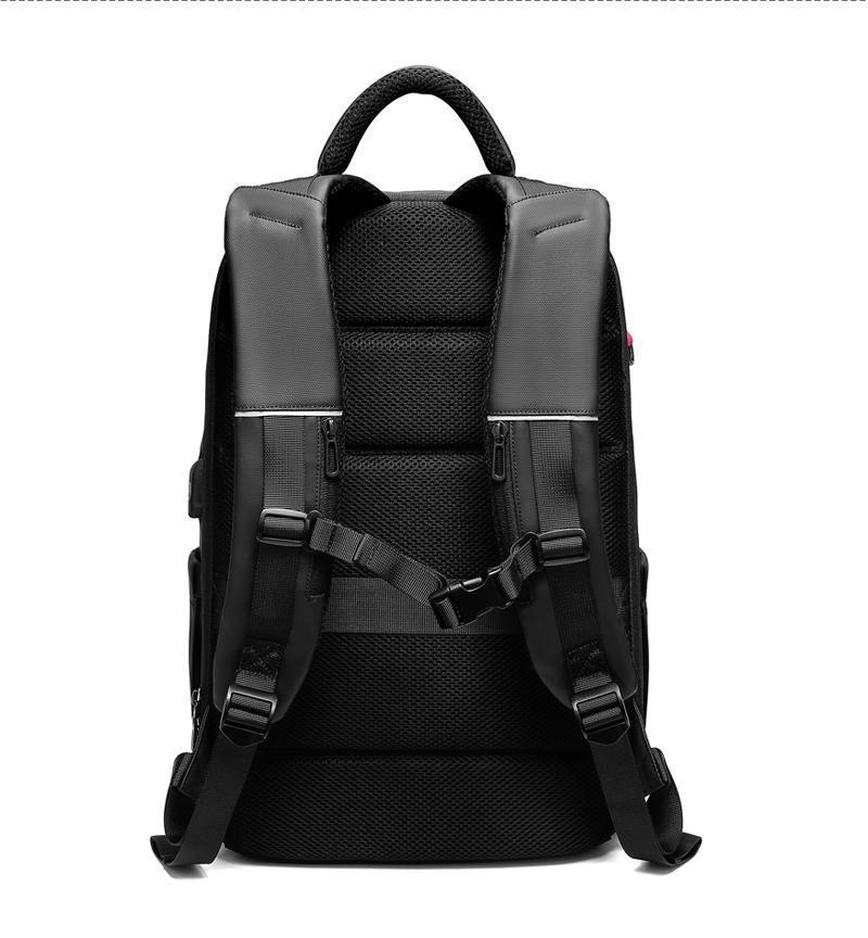 Mochila de viaje para portátil de 15,6 pulgadas con puerto USB y repelente al agua