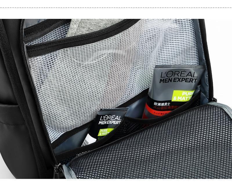 Mochila de viaje para portátil de 15,6 pulgadas con puerto USB y repelente al agua